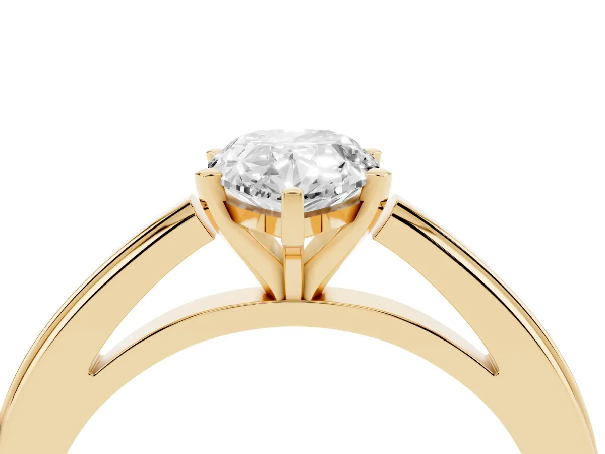 Pear Cut Solitaire Diamond Ring with Four-Prong Setting and Classic Band Yellow gold
