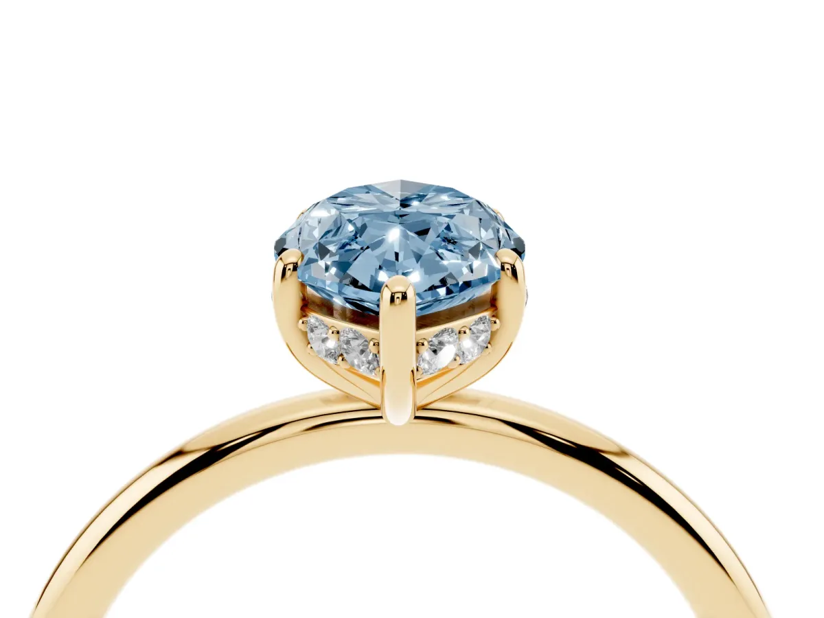 Fancy Blue Marquise Cut Solitaire Diamond Ring with a Classic Band and Four-Prong Setting Yellow gold