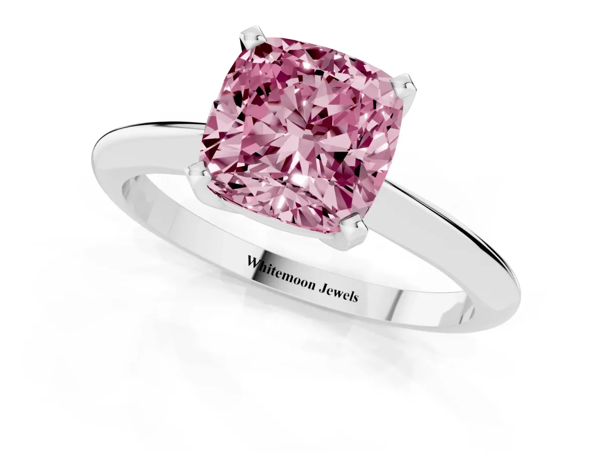 Fancy Pink Cushion Cut Cut Solitaire Ring with Four-Prong Setting on a Classic Band Silver