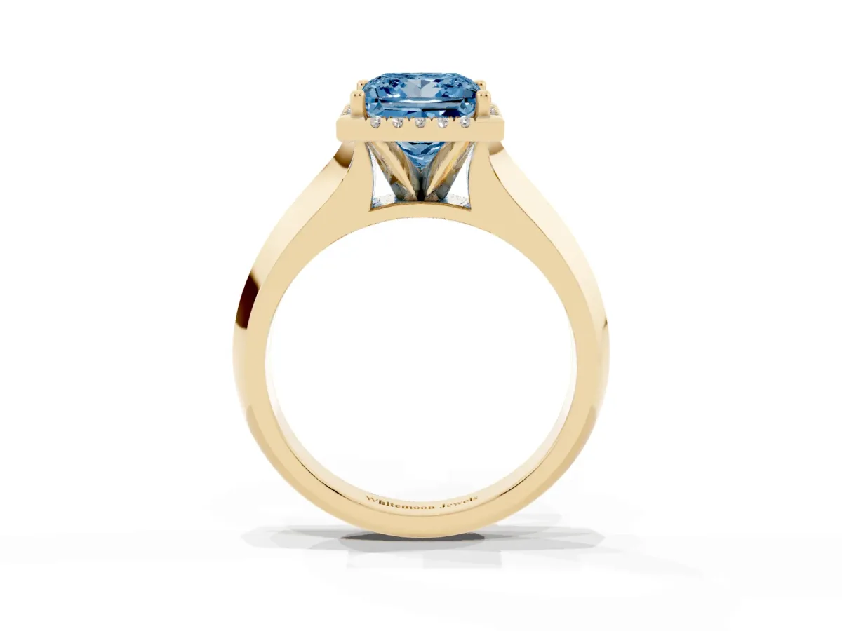 Fancy Blue Princess Cut Halo Diamond Ring with Cathedral Band and Four-Prong Setting Yellow gold
