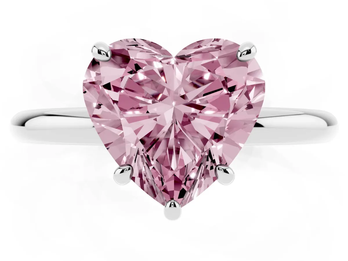 Fancy Pink Heart Cut Solitaire Diamond Ring with Four-Prong Setting on a Plain Band Platinum