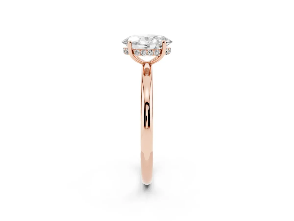 Oval Cut Diamond Solitaire Ring with Thin Band and Four-Prong Setting Rose gold