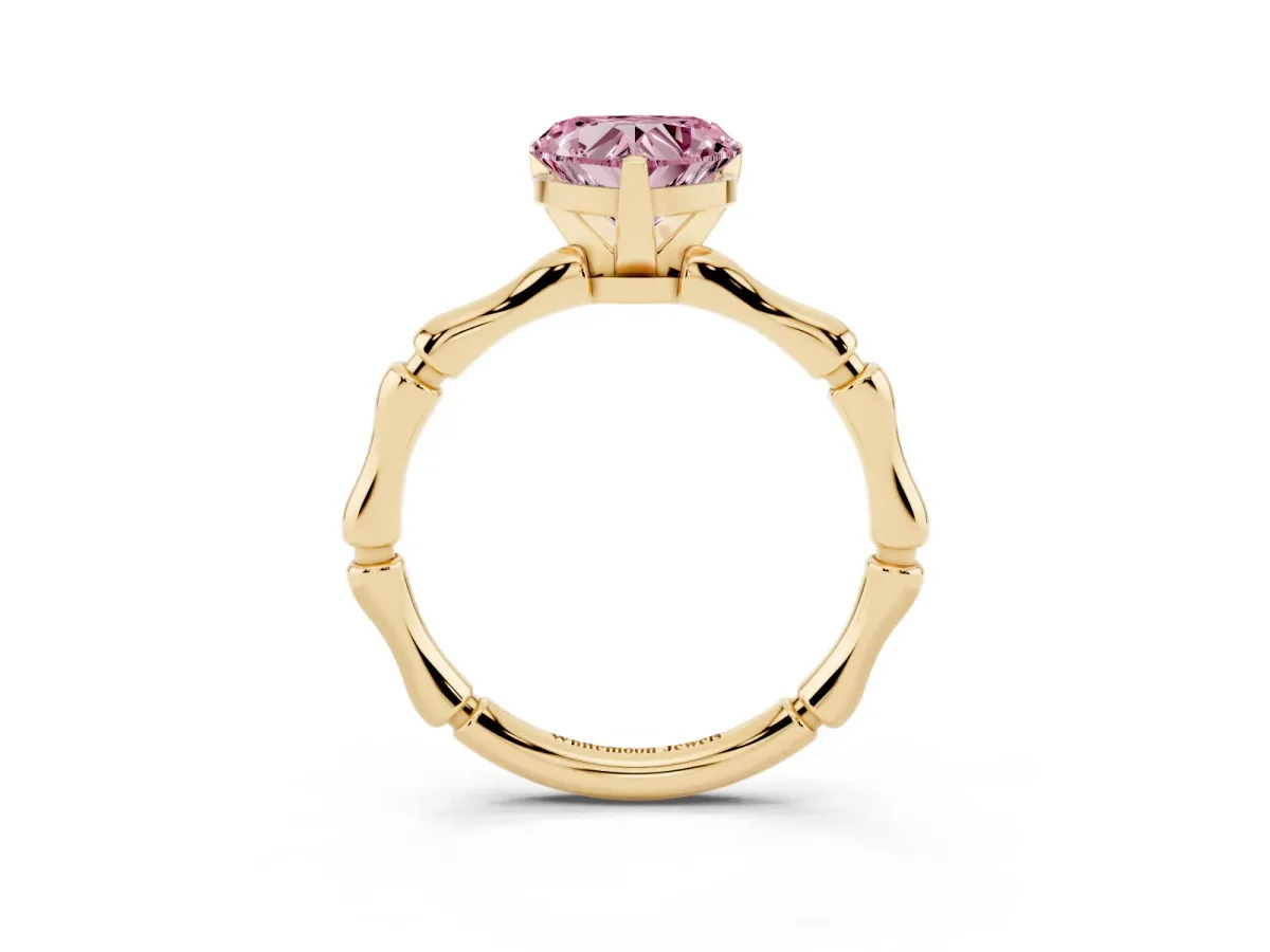 Fancy Pink Heart Cut Solitaire Diamond Ring with Bamboo Band and Four-Prong Setting Yellow gold