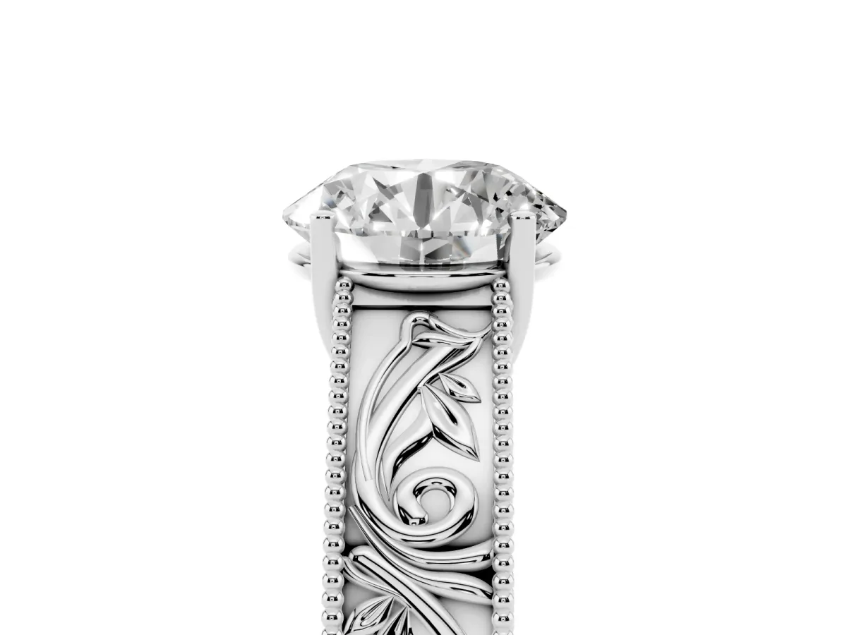 Round Cut Diamond Solitaire Ring with Engraved Band and Four-Prong Setting White gold