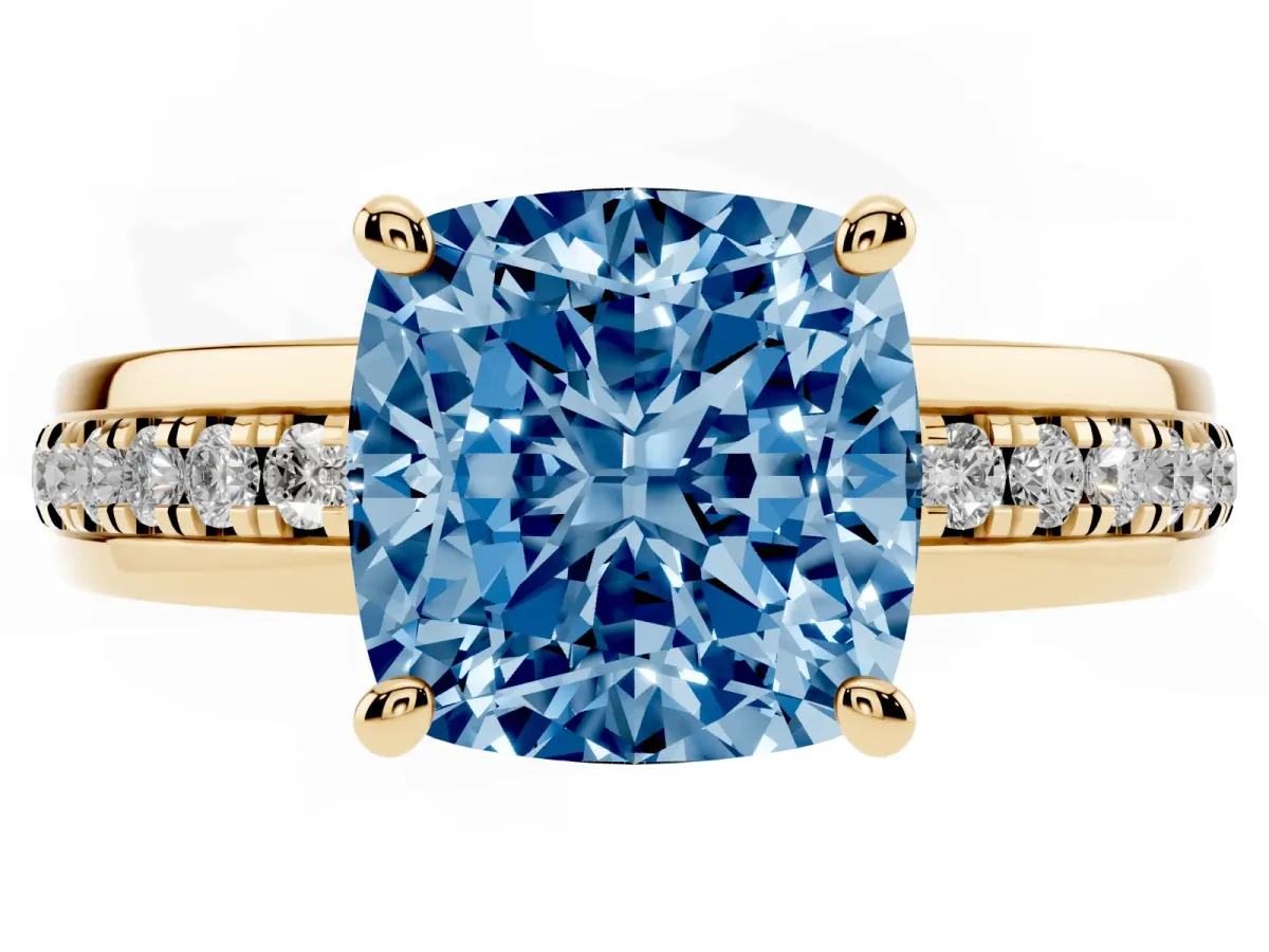 Fancy Blue Cushion Cut Solitaire Diamond Ring with Channel Set Band and Six-Prong Setting Yellow gold