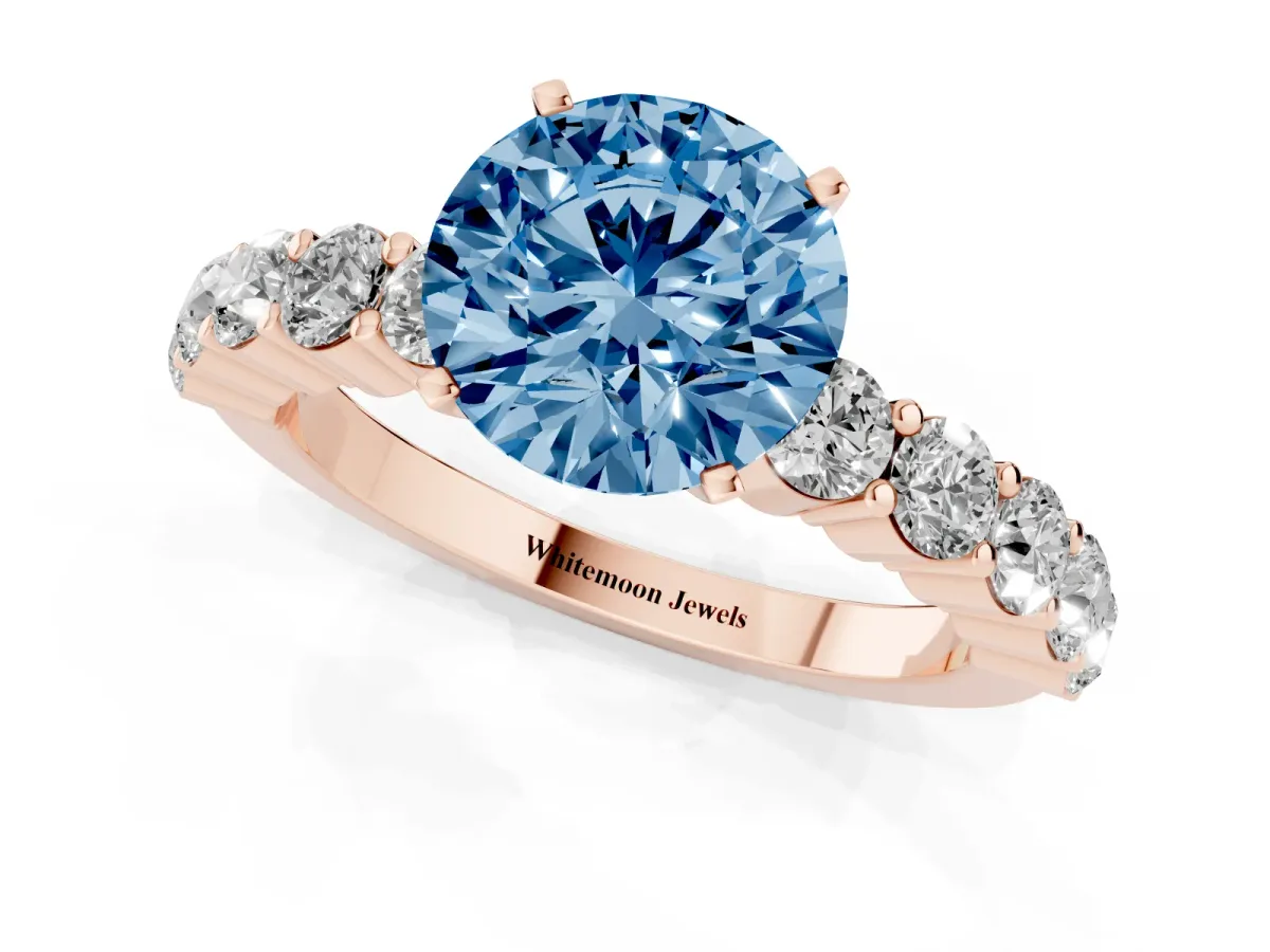 Fancy Blue Round Cut Diamond Solitaire Ring with Shared Prong Round Side Stones Rose gold