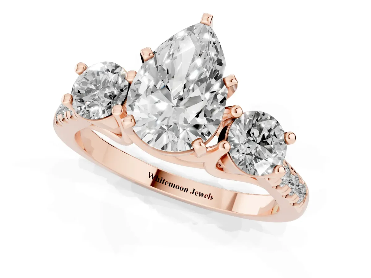 Three-Stone Pear Cut Diamond Pavé Band with Four-Prong Setting Rose gold