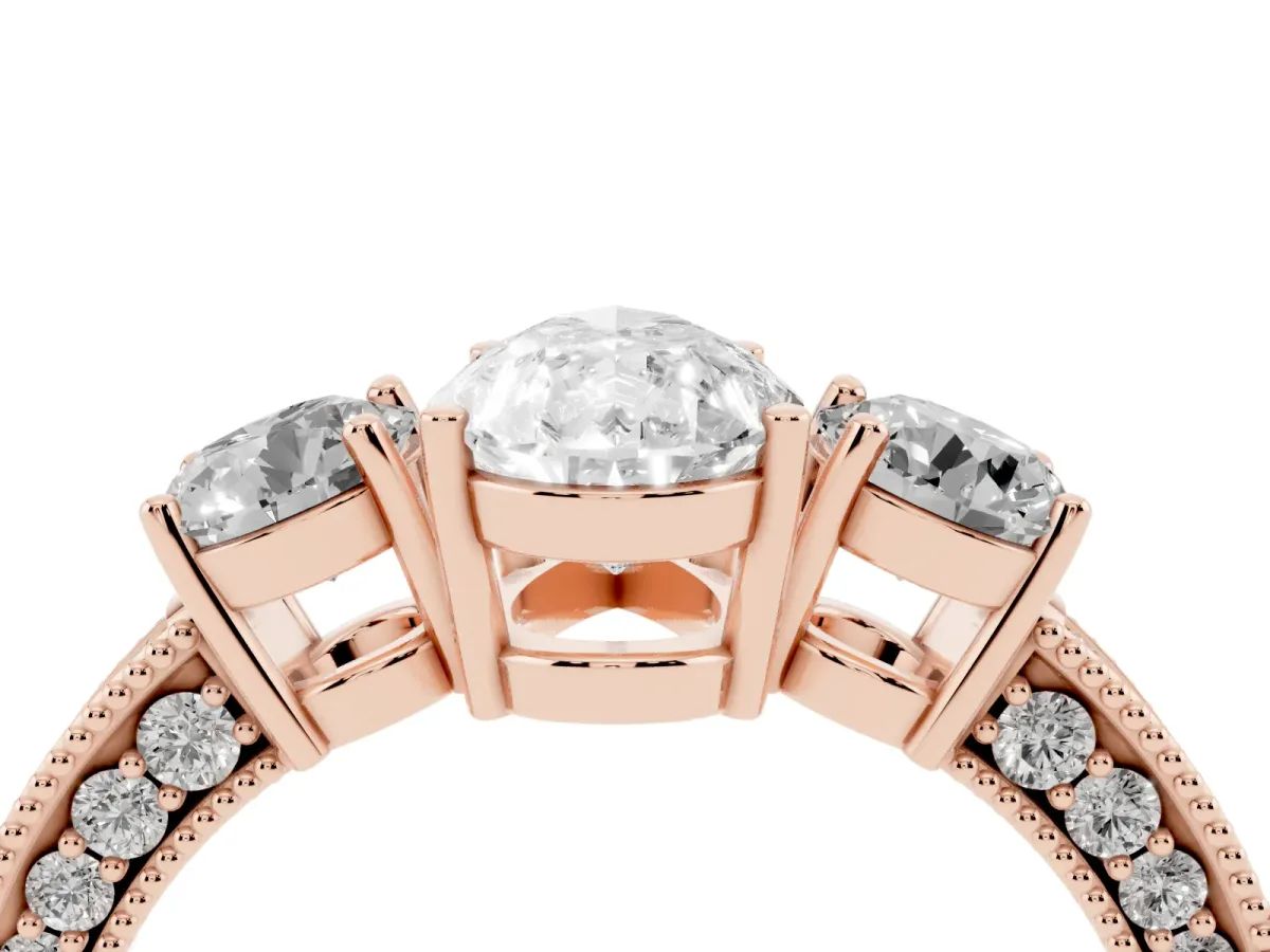 Pear Cut Three-Stone Diamond Ring with Pavé Band and Four-Prong Setting Rose gold