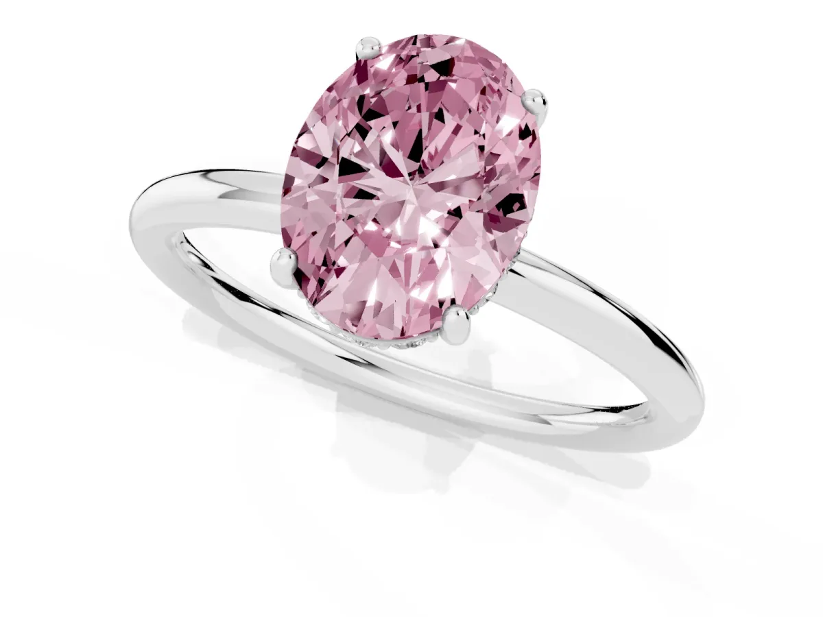 Fancy Pink Oval Cut Solitaire Diamond Ring with a Classic Band and Four-Prong Setting Silver