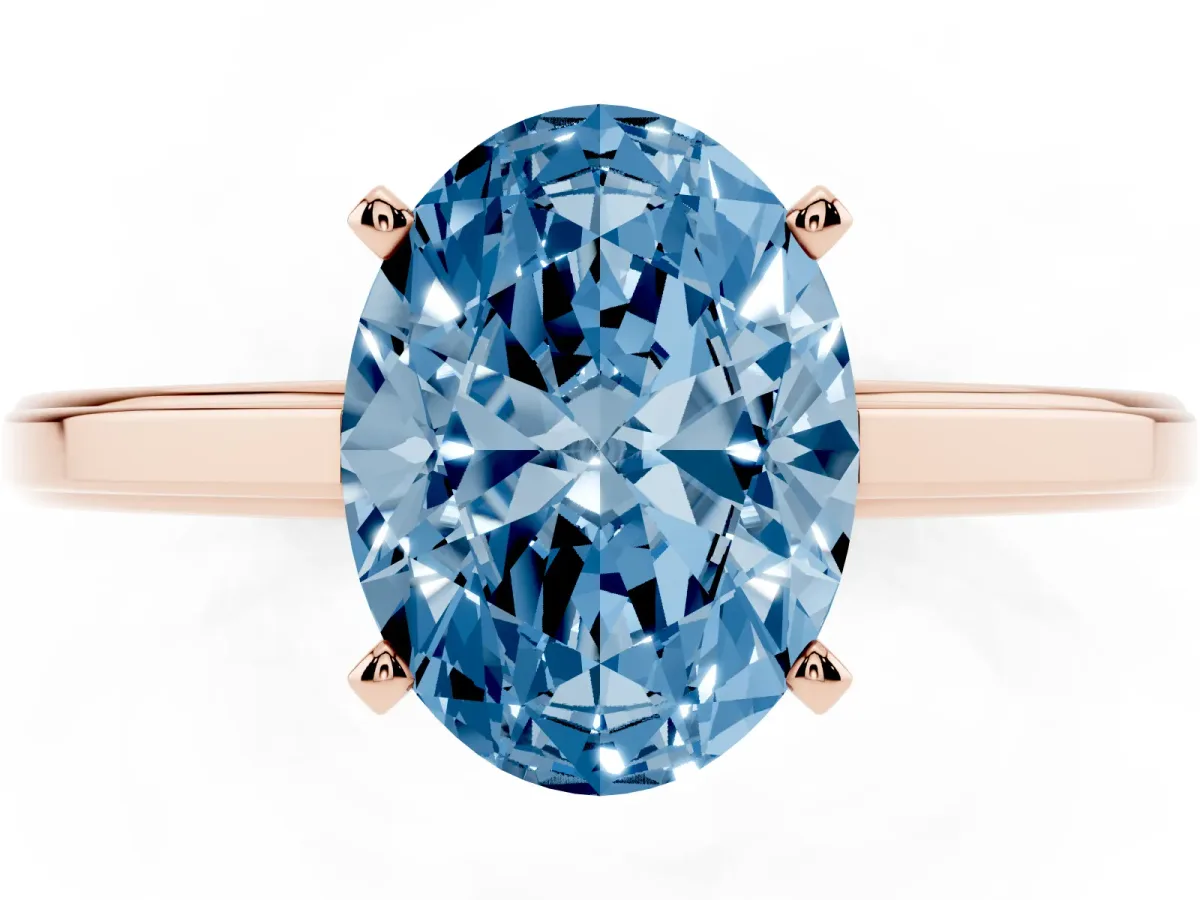 Fancy Blue Oval Cut Solitaire Diamond Ring with Four-Prong Setting and Classic Band Rose gold