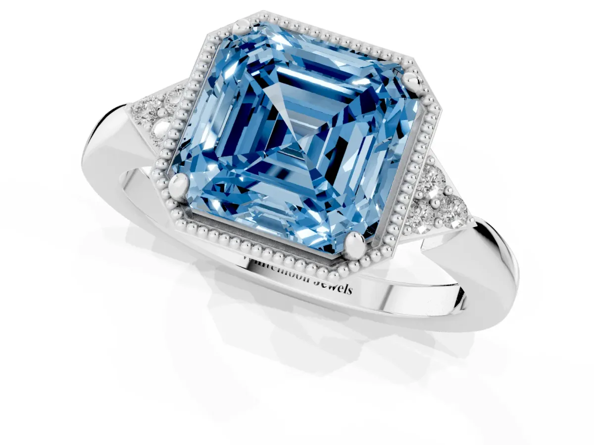 Fancy Blue Asscher Cut Diamond Halo Ring with Tapered Band and Four-Prong Setting White gold
