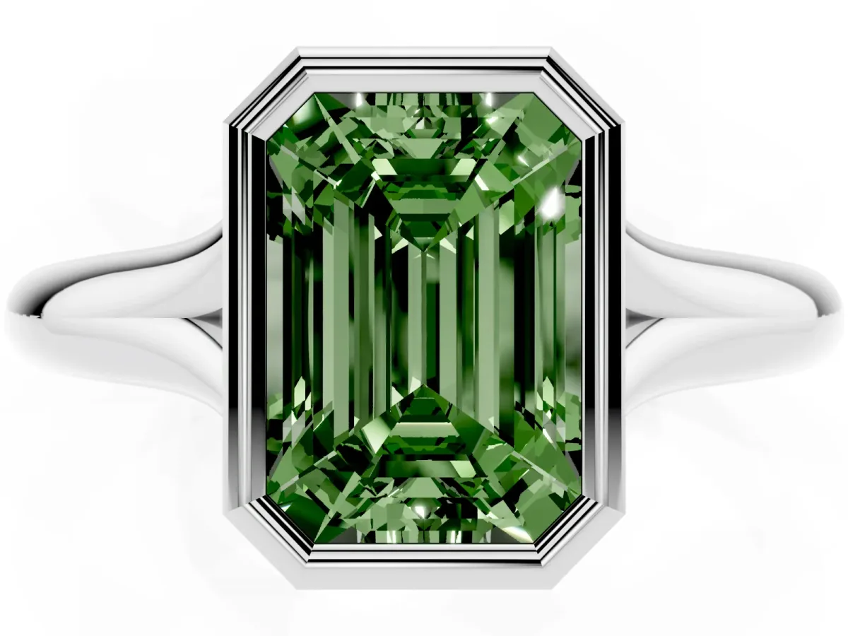 Fancy Green Bezel Set Emerald Cut Solitaire Diamond Ring with Smooth Band Silver