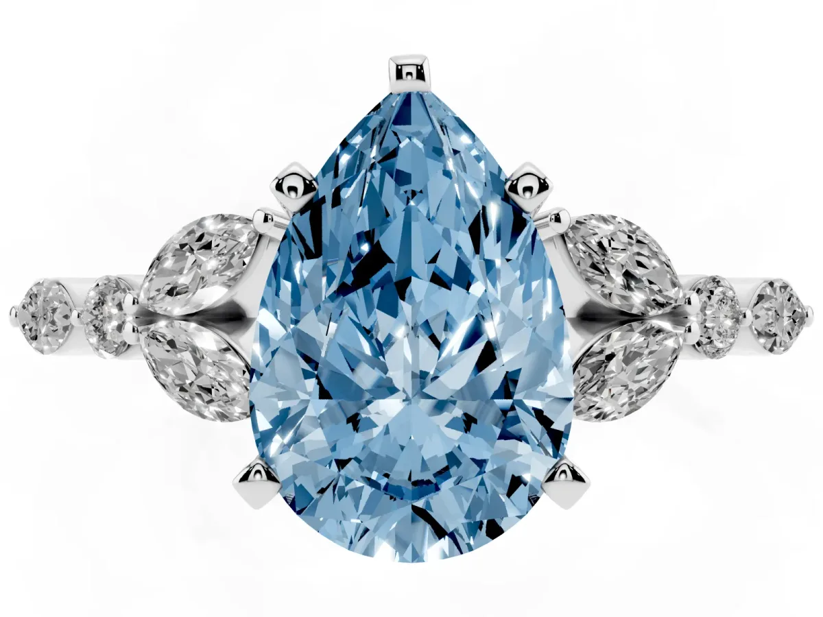 Fancy Blue Pear Cut Diamond Solitaire Ring with Side Stones and Four-Prong Setting Silver