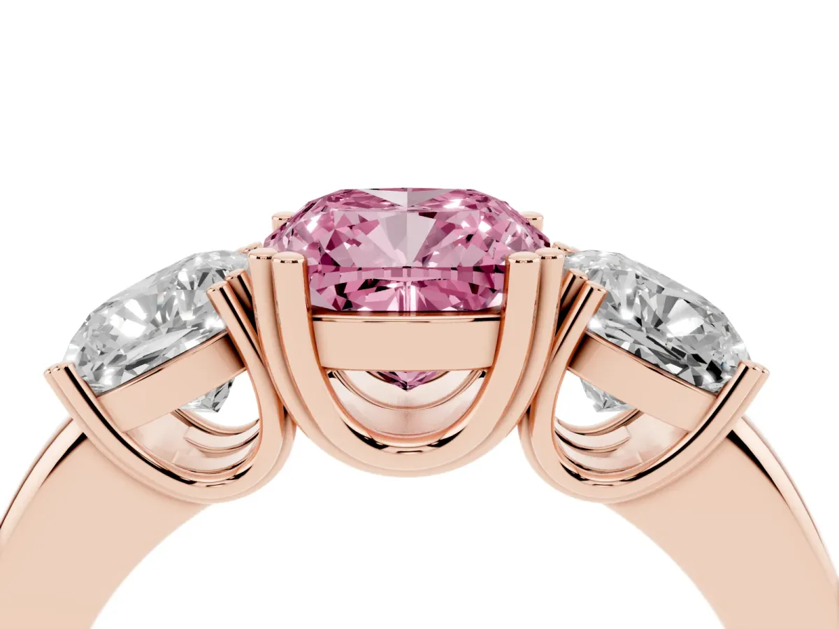 Fancy Pink Three-Stone Cushion Cut Cut Diamond Ring with Channel Set Band and Four-Prong Setting Rose gold