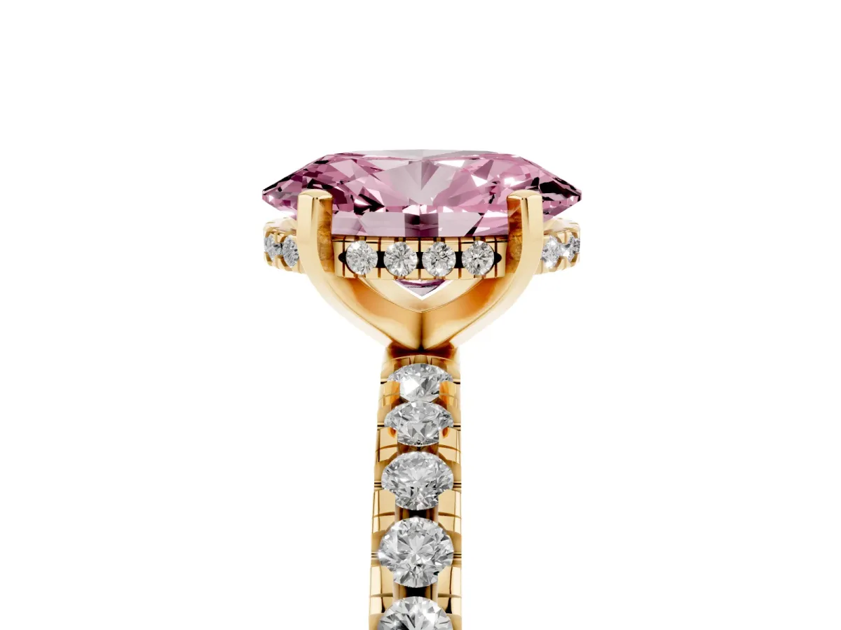 Fancy Pink Oval Cut Diamond Solitaire Ring with Round Pavé Band and Four-Prong Setting Yellow gold
