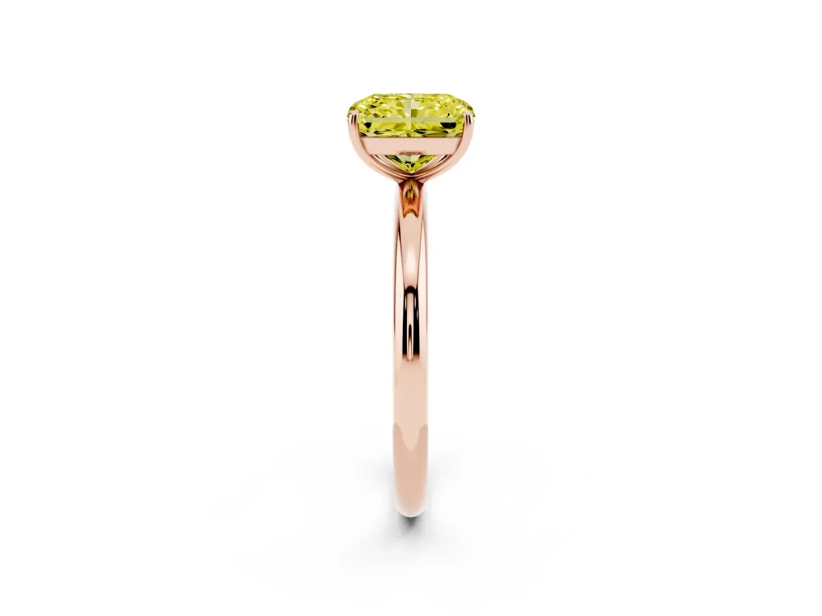 Fancy Yellow Radiant Cut Solitaire Diamond Ring with Four-Prong Setting on a Plain Band Rose gold