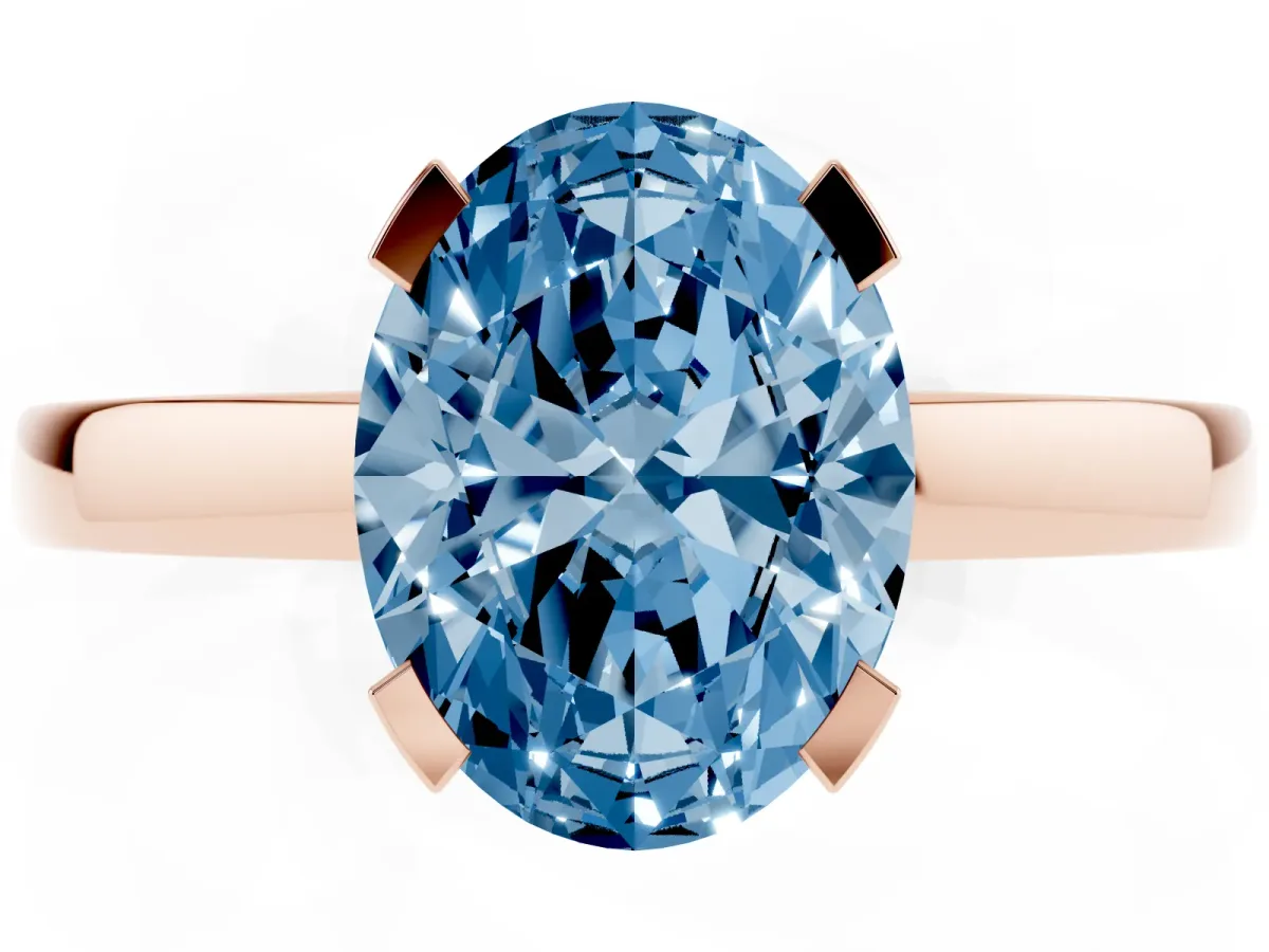 Fancy Blue Oval Cut Cut Solitaire Ring with Four-Prong Setting and Classic Band Rose gold