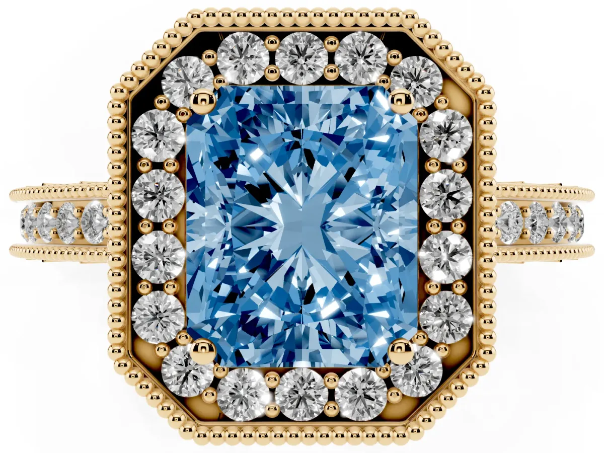 Fancy Blue Radiant Cut Diamond Milgrain Halo Engagement Ring with Round Pavé Band and Prong Setting Yellow gold