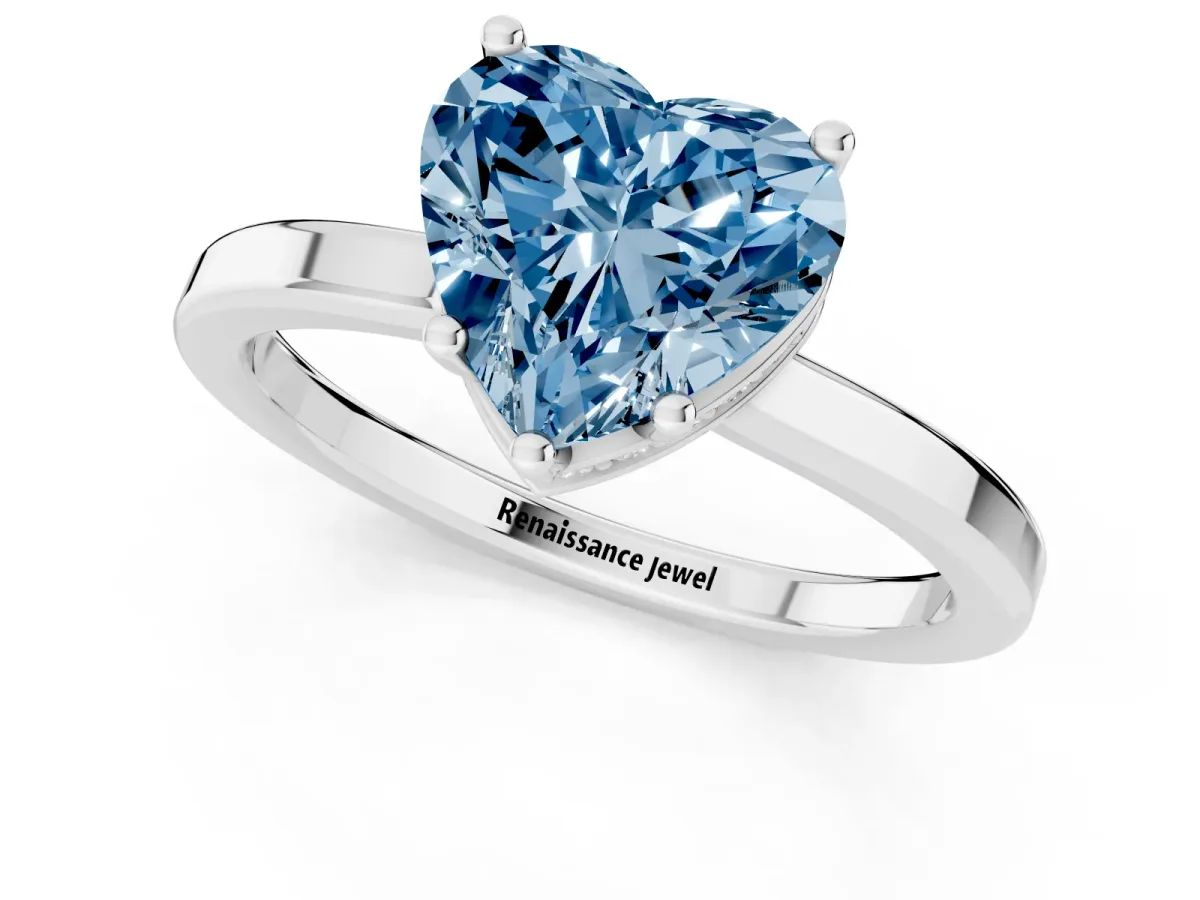 Fancy Blue Heart Cut Cut Solitaire Engagement Ring with Four-Prong Setting on a Classic Band Silver