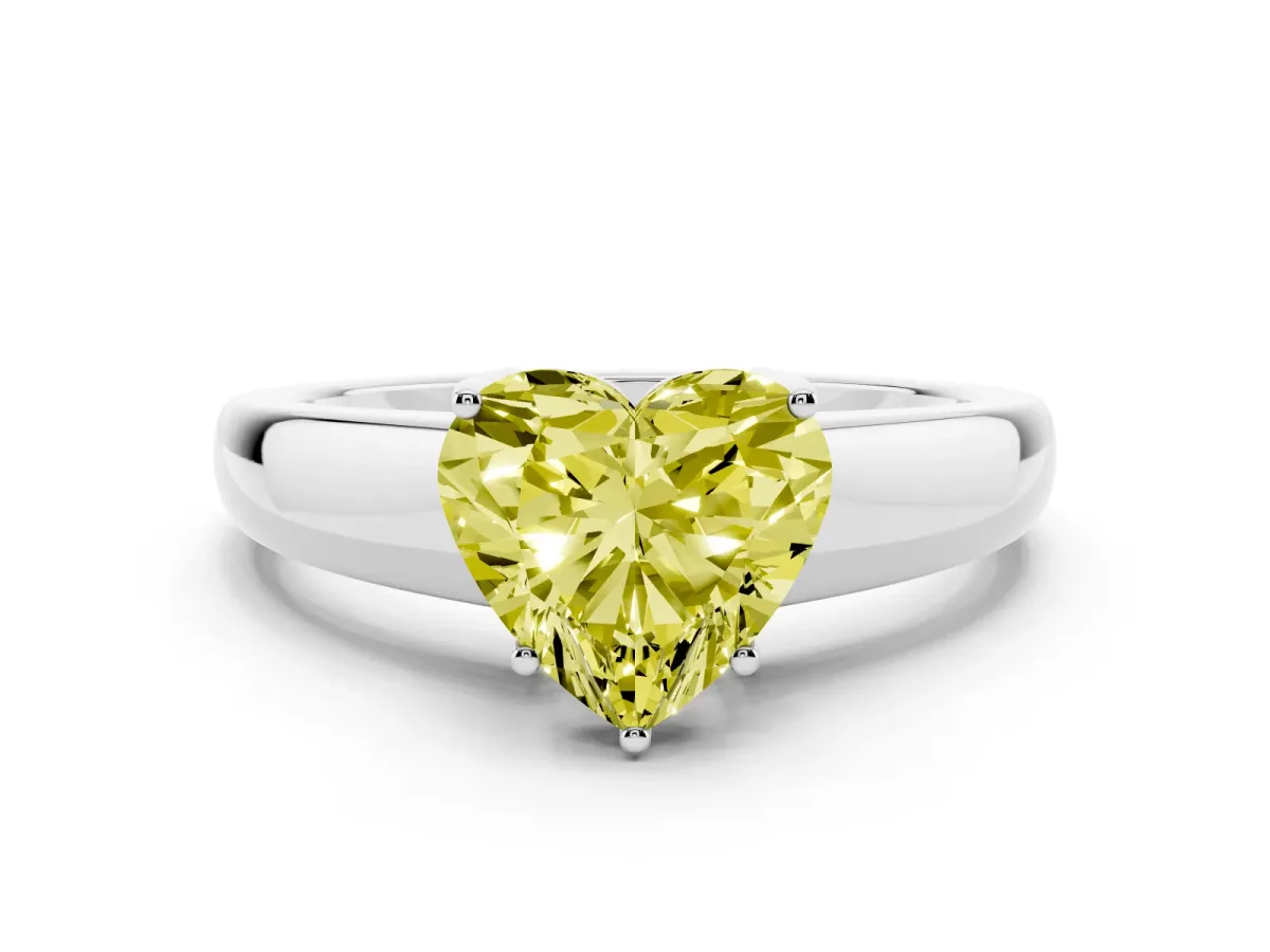 Fancy Yellow Heart Cut Solitaire Diamond Ring with Tapered Band and Four-Prong Setting Silver