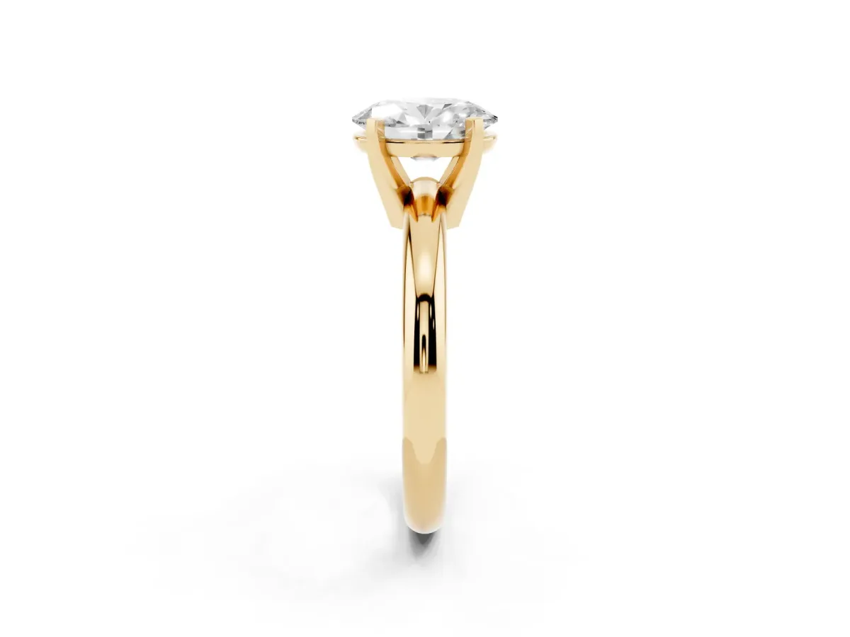 Oval Cut Diamond Solitaire Engagement Ring with Round Band and Four-Prong Setting Yellow gold