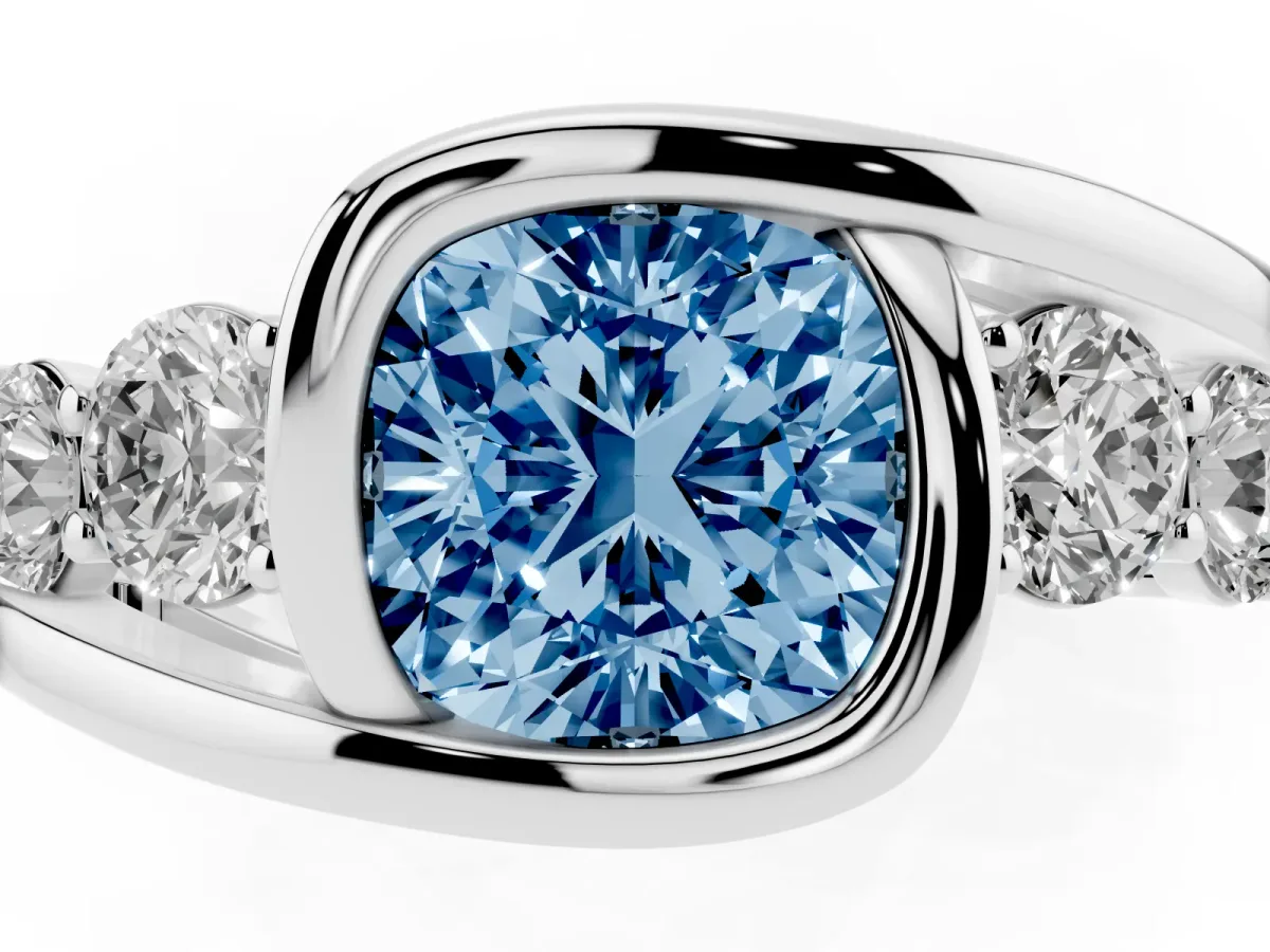Fancy Blue Bezel Set Cushion Cut Diamond Bypass Ring with Round Accents Silver