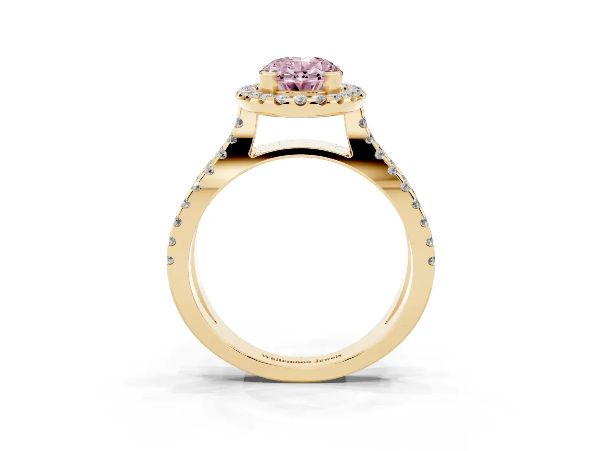 Fancy Pink Oval Cut Diamond Halo Ring with Split Shank Pavé Band and Prong Setting Yellow gold