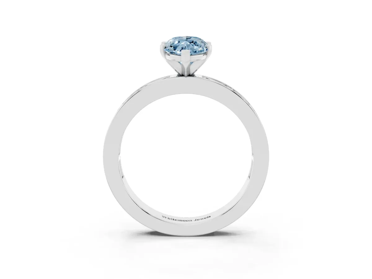 Fancy Blue Marquise Cut Solitaire Diamond Ring with Channel-Set Baguette Band and Four-Prong Setting White gold