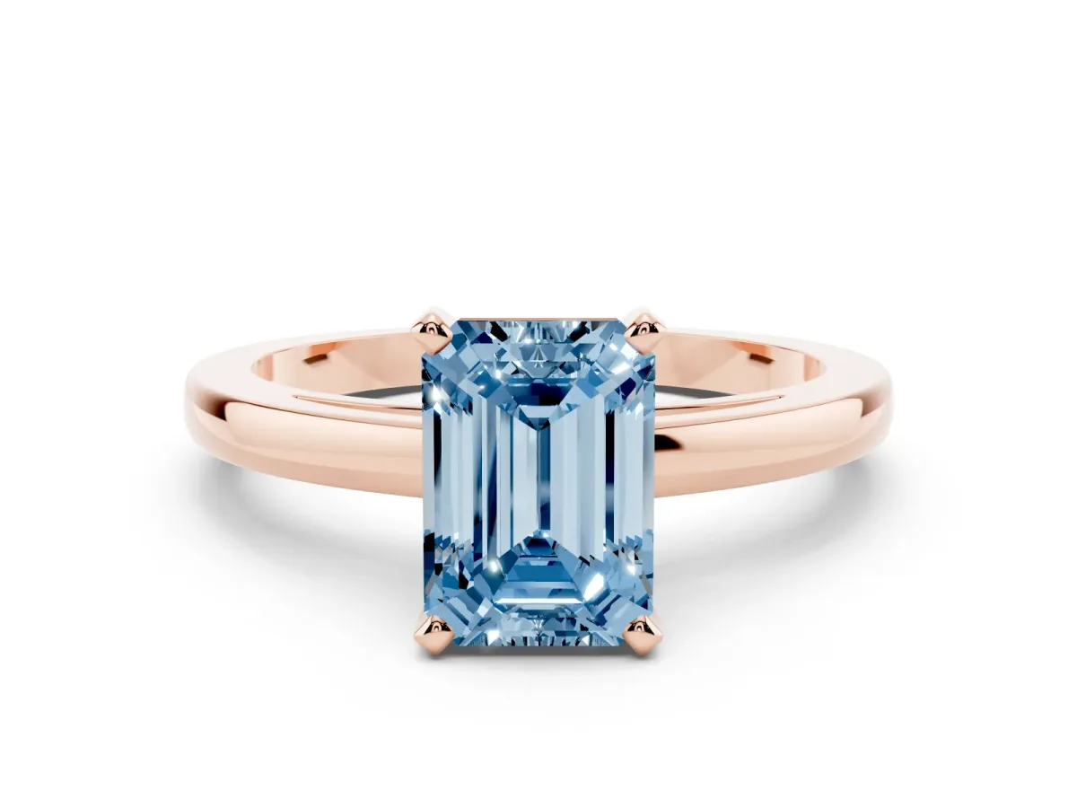 Fancy Blue Emerald Cut Solitaire Diamond Engagement Ring with Four-Prong Setting on a Classic Band Rose gold