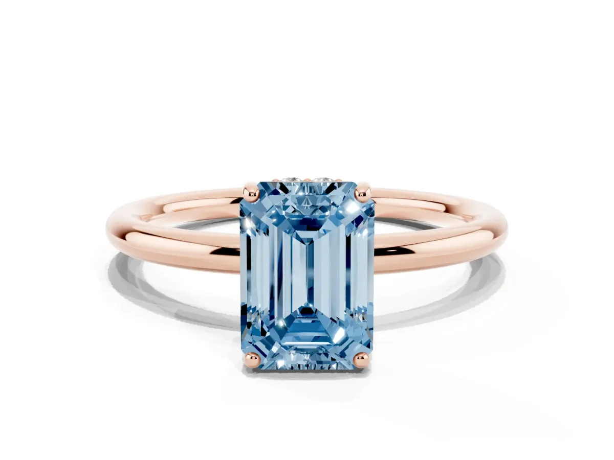 Fancy Blue Emerald Cut Solitaire Diamond Ring with a Classic Band and Four-Prong Setting Rose gold