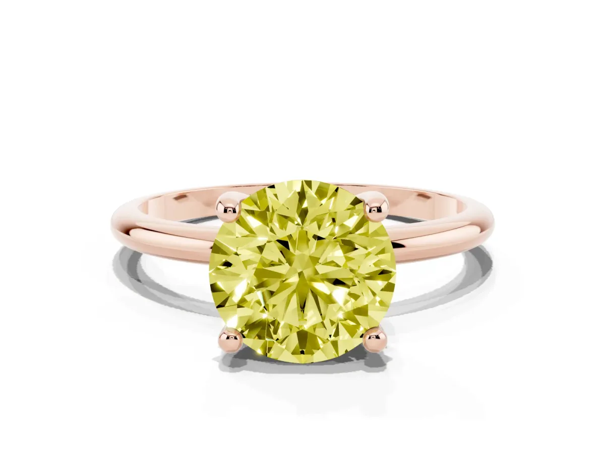 Fancy Yellow Round Cut Solitaire Diamond Ring with 4-Prong Setting on a Classic Band Rose gold