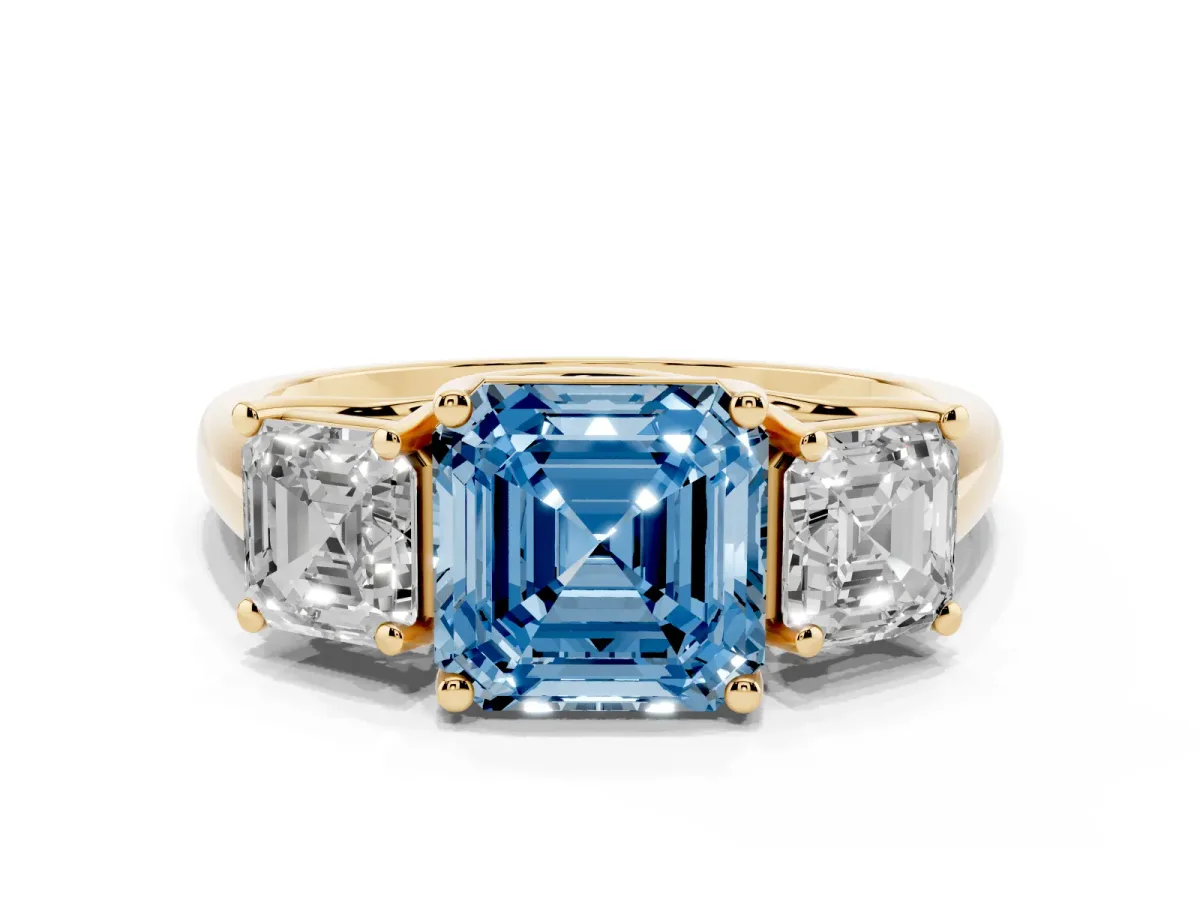 Fancy Blue Three-Stone Asscher Cut Diamond Engagement Ring with Prong Setting Yellow gold