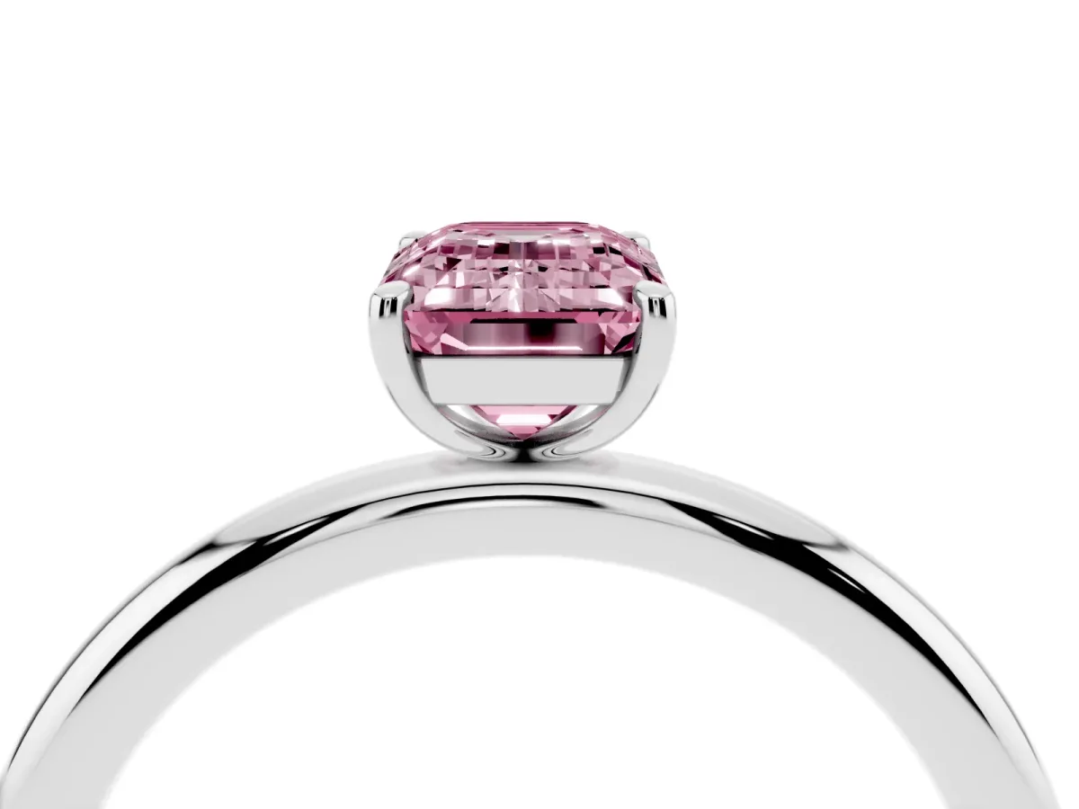 Fancy Pink Emerald Cut Solitaire Diamond Ring with Four-Prong Setting on a Plain Band Silver