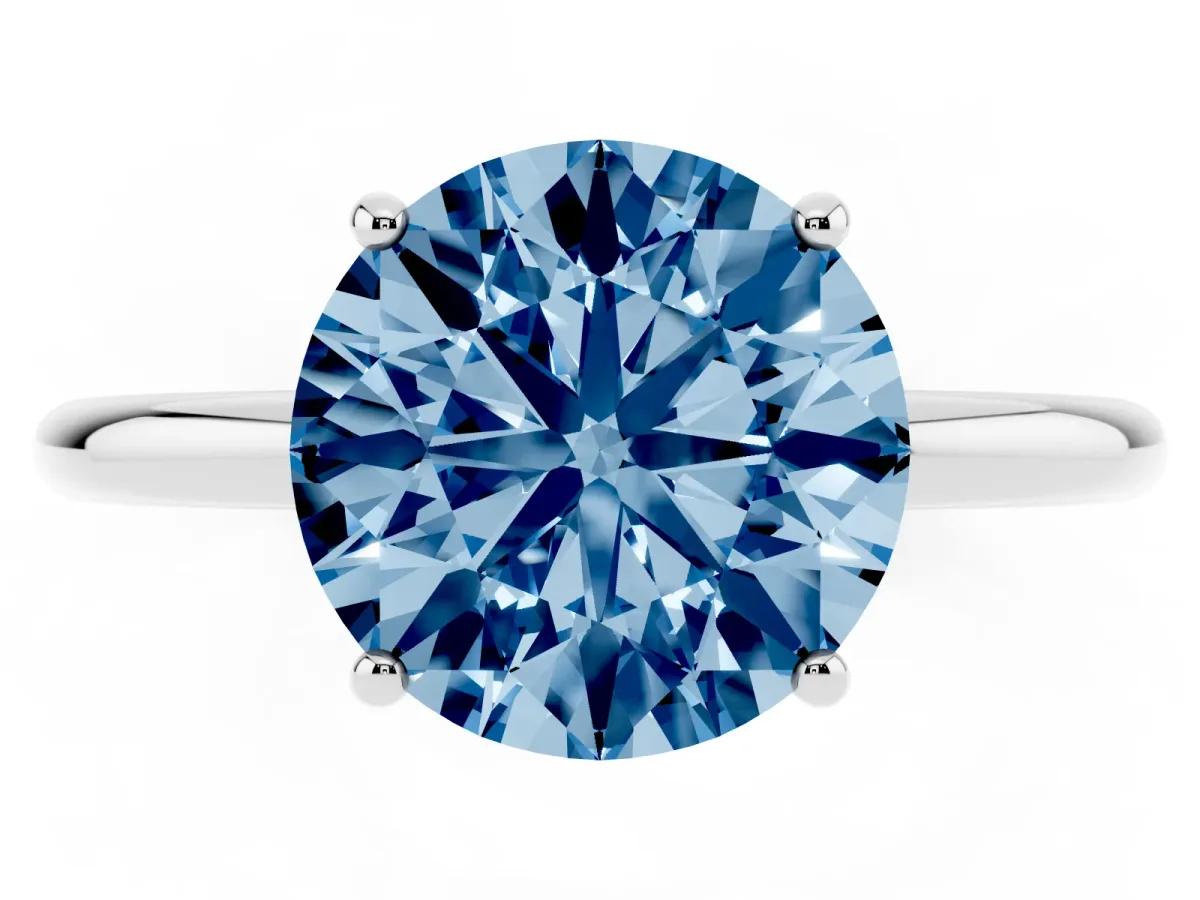 Fancy Blue Round Cut Solitaire Diamond Ring with a Classic Band and Four-Prong Setting Silver
