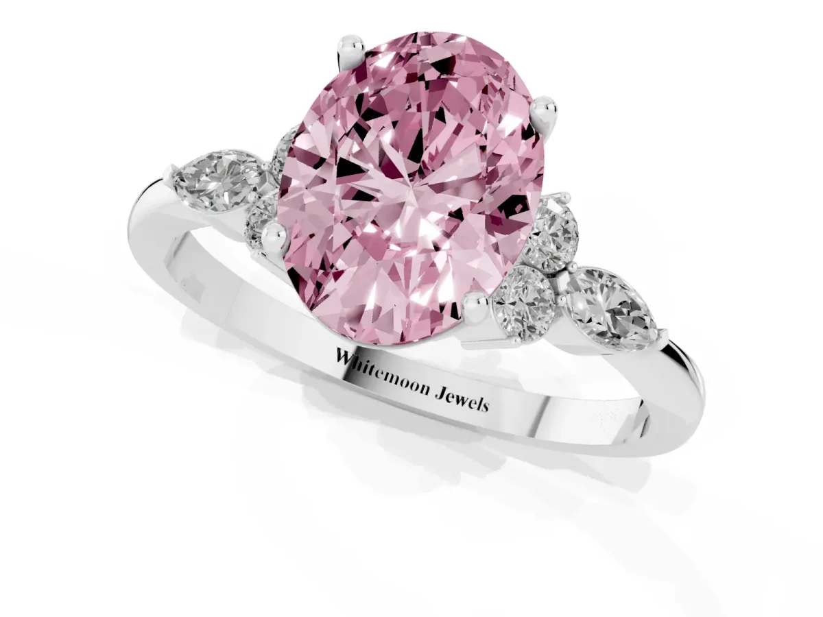 Fancy Pink Oval Cut Brilliant Diamond Solitaire Ring with Pear Side Stones and Four-Prong Setting Silver