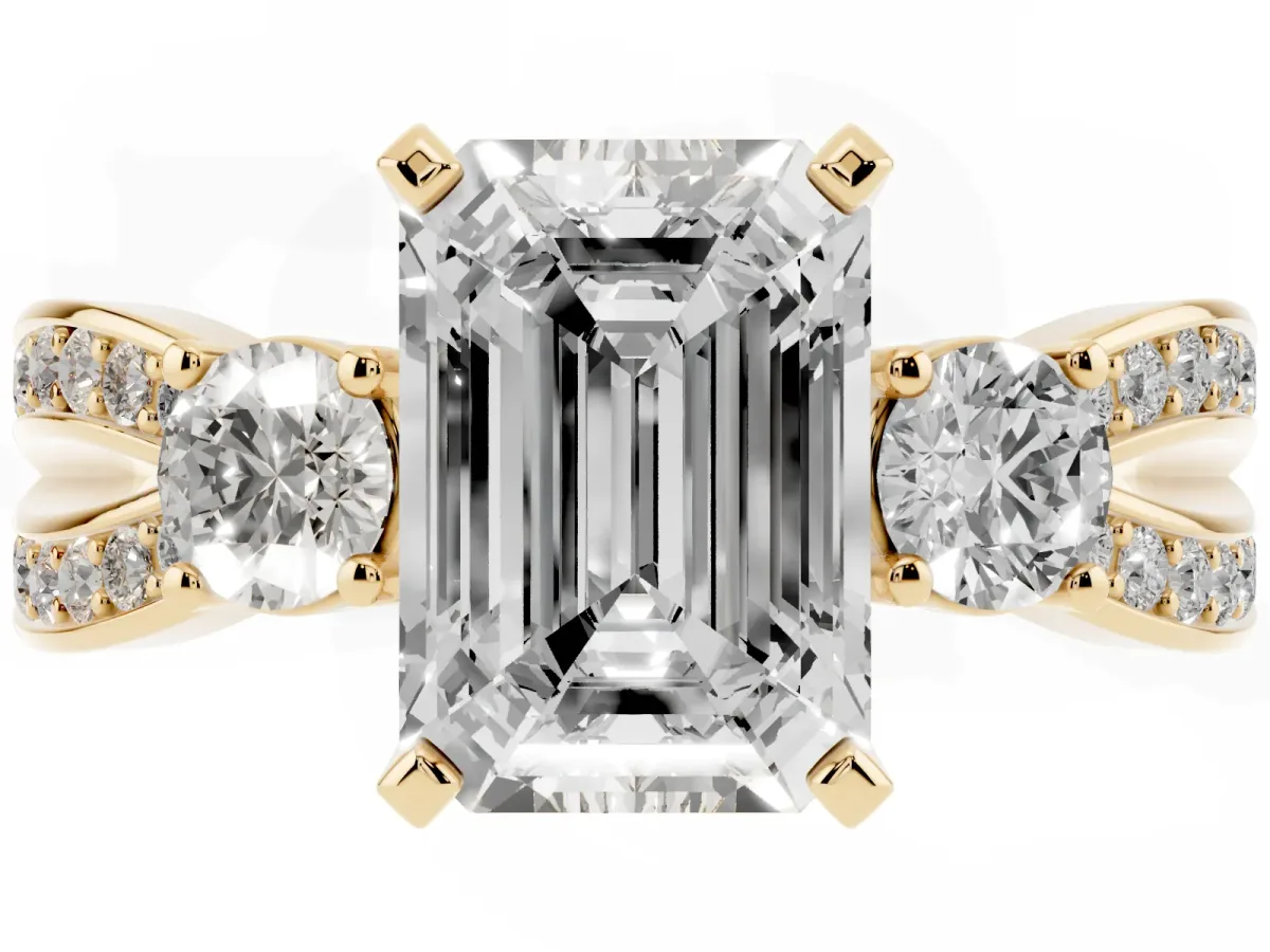 Three-Stone Emerald Cut Cut Diamond Twist Band with Prong Setting Yellow gold