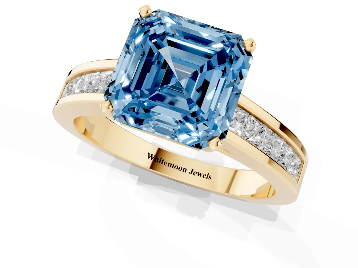 Fancy Blue Asscher Cut Solitaire Diamond Ring with Channel-Set Band and Four-Prong Setting Yellow gold