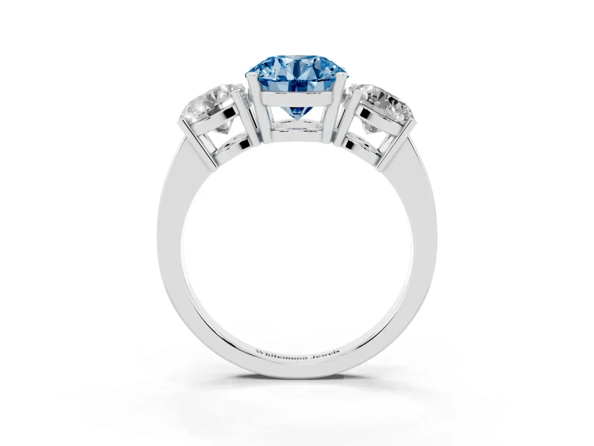 Fancy Blue Three-Stone Round Cut Cut Diamond Engagement Ring with Flat Band and Four-Prong Setting Silver