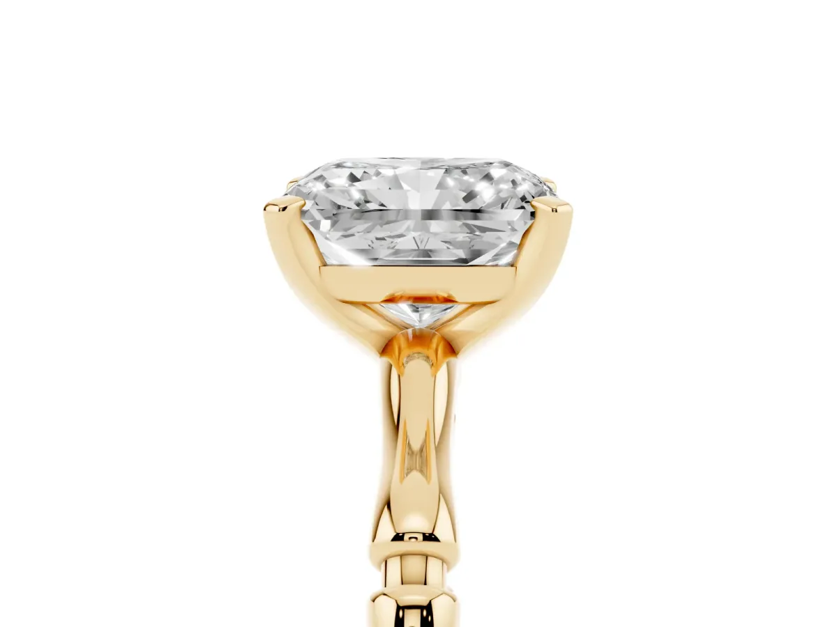 Radiant Cut Solitaire Diamond Ring with Bamboo Band and Four-Prong Setting Yellow gold