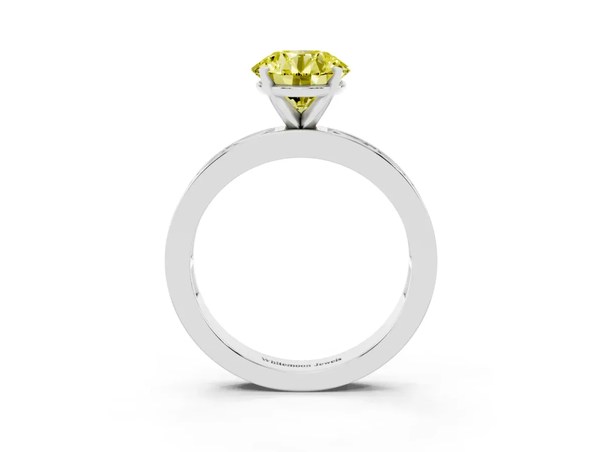 Fancy Yellow Round Cut Solitaire Diamond Ring with Channel-Set Baguette Band and Four-Prong Setting White gold