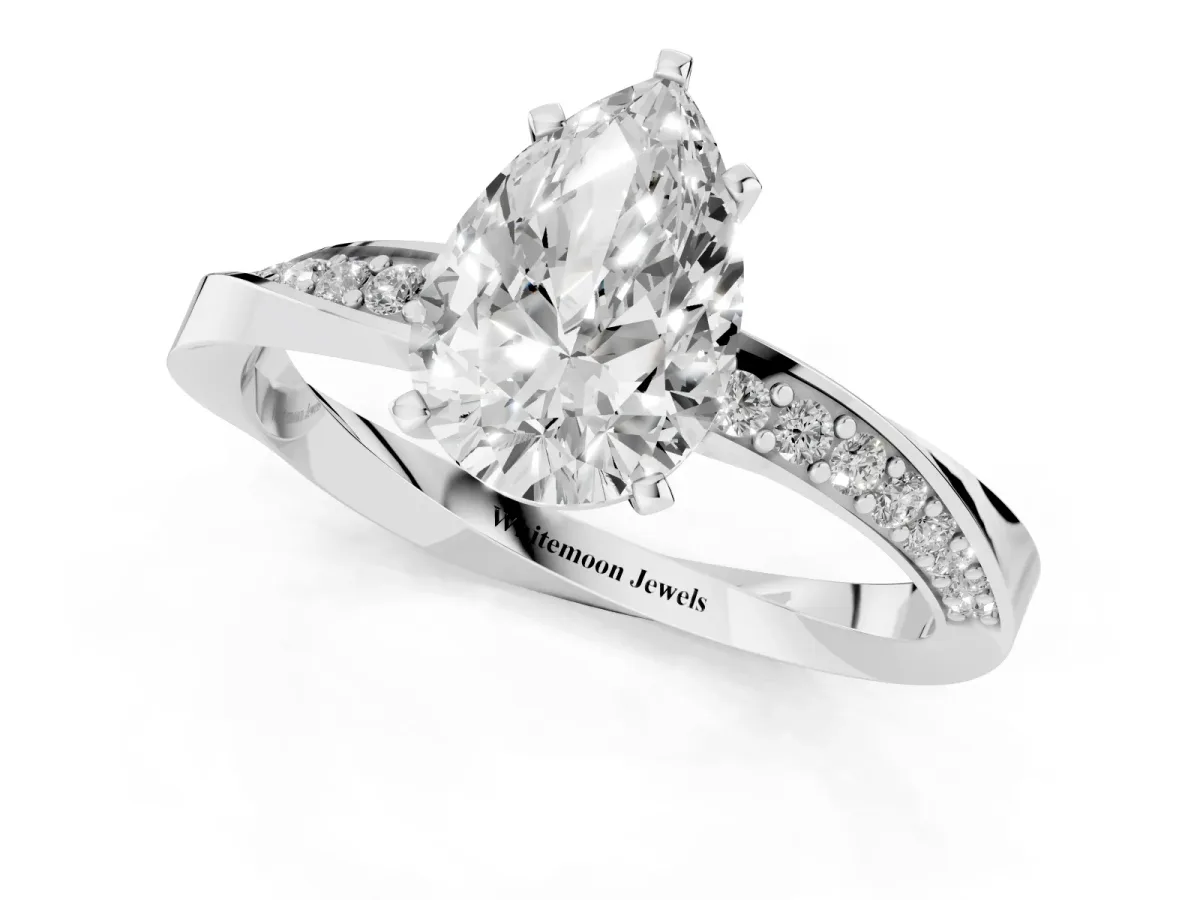 Pear Cut Diamond Engagement Ring with Side Stone Accents and Four-Prong Setting Silver