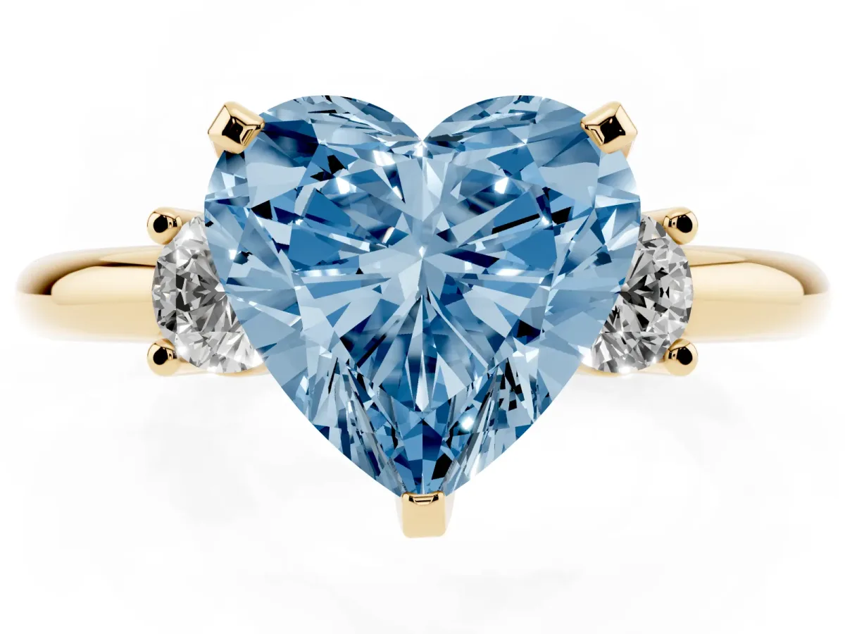 Fancy Blue Three-Stone Heart Cut Cut Diamond Solitaire with Prong Setting and Classic Band Yellow gold