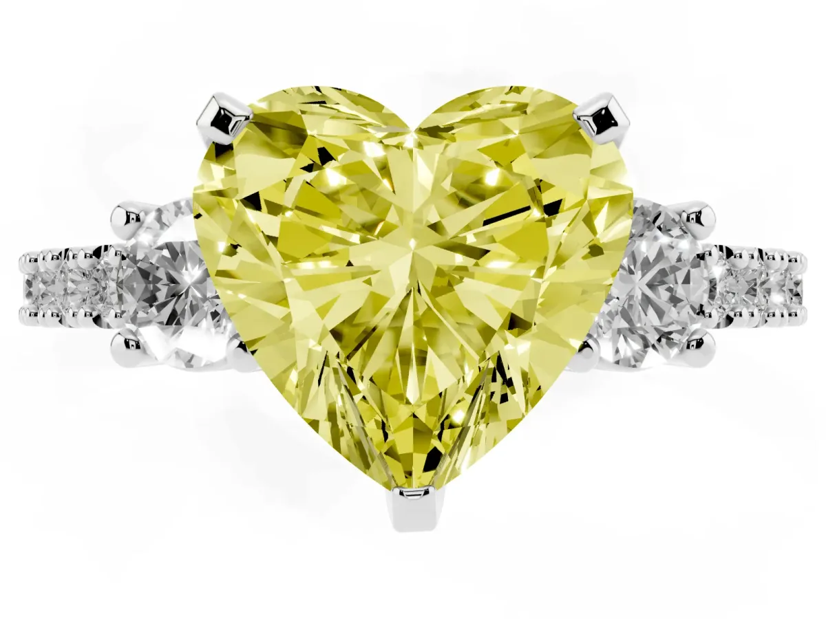 Fancy Yellow Heart Cut Three-Stone Diamond Pavé Band with Prong Setting Platinum