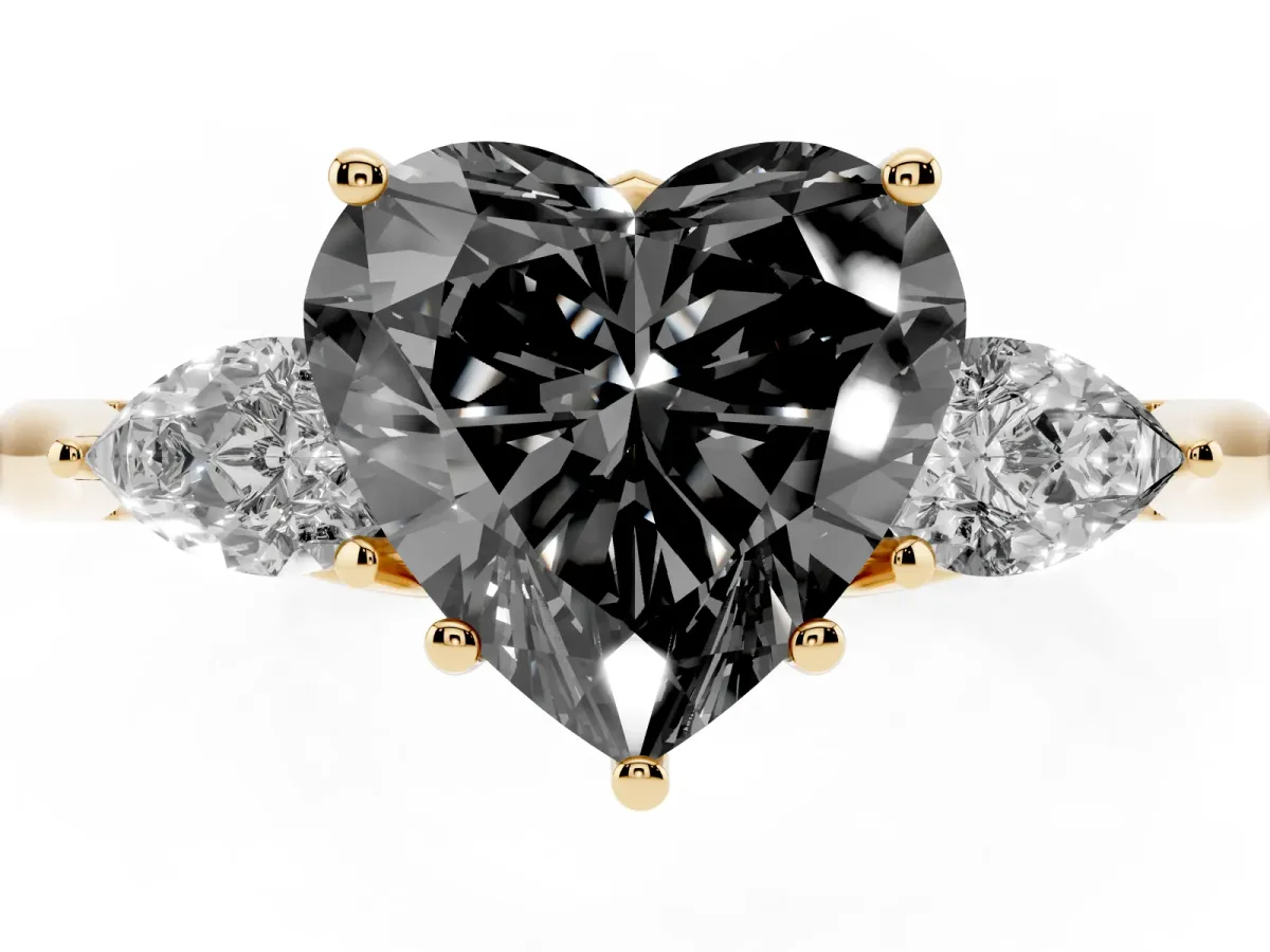 Fancy Black Heart Cut Diamond Three-Stone Ring with Pear Side Stones and Prong Setting Yellow gold