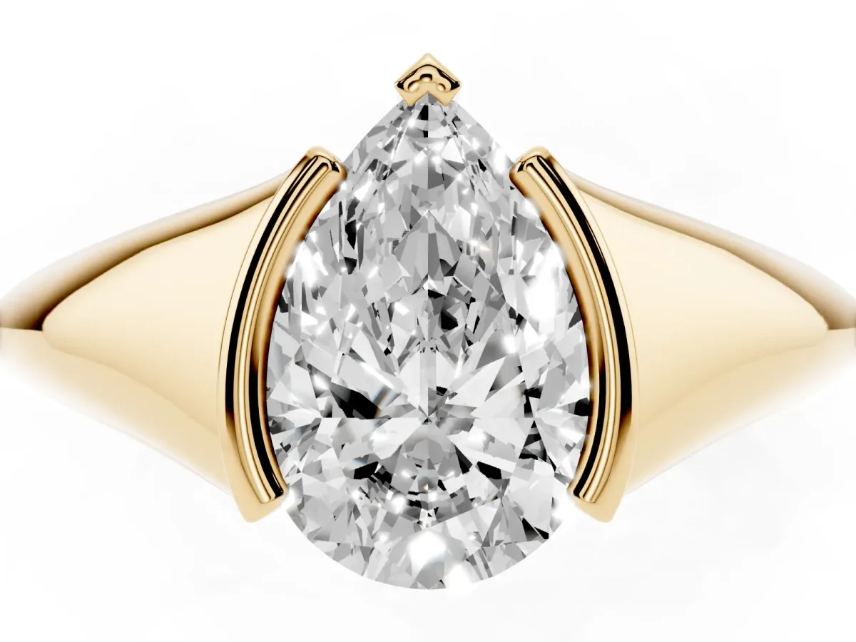 Pear Cut Solitaire Tension Set Diamond Ring Yellow gold
