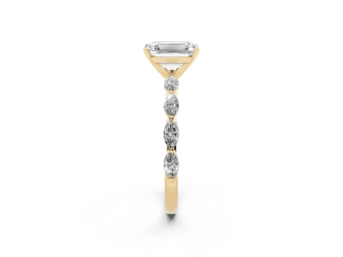 Emerald Cut Diamond Ring with Marquise Side Stones and Prong Setting Yellow gold