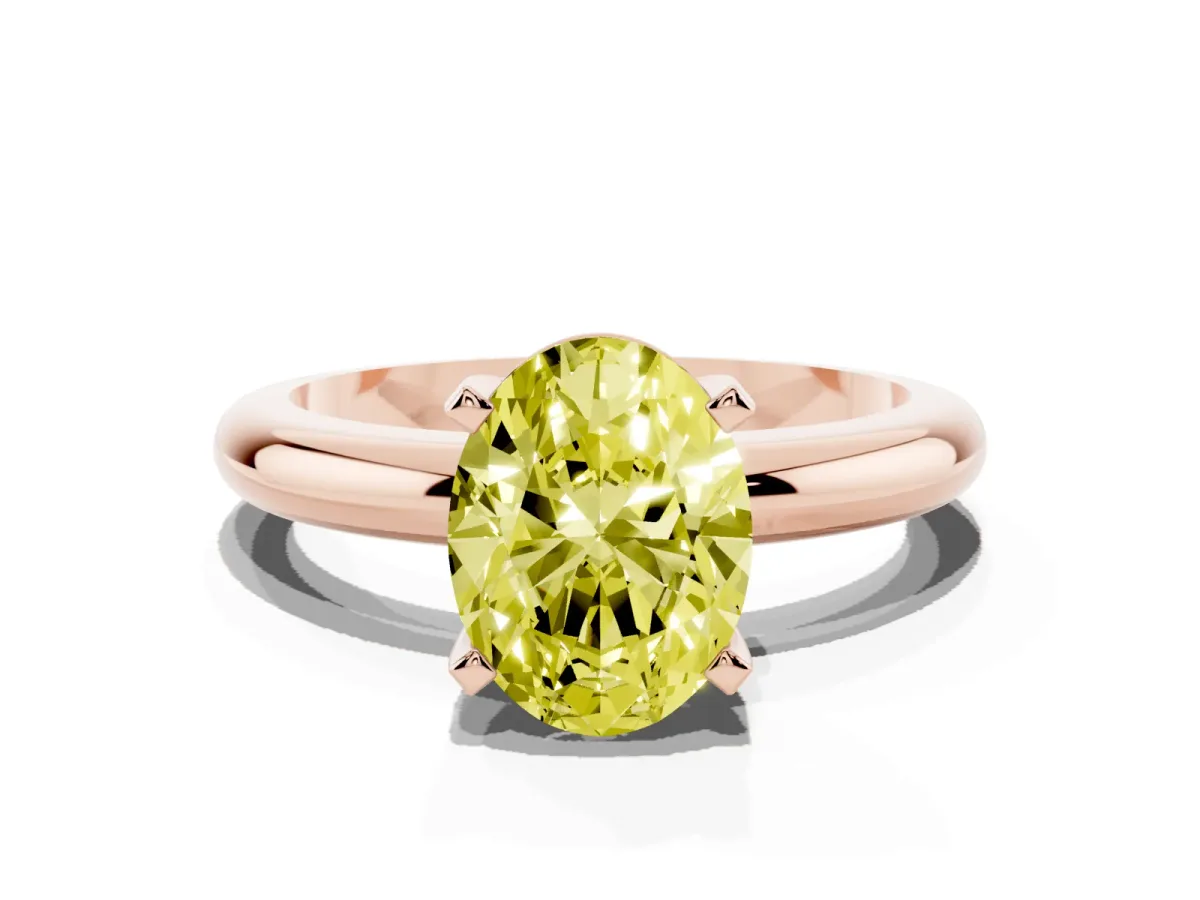 Fancy Yellow Oval Cut Diamond Solitaire Engagement Ring with Round Band and Four-Prong Setting Rose gold