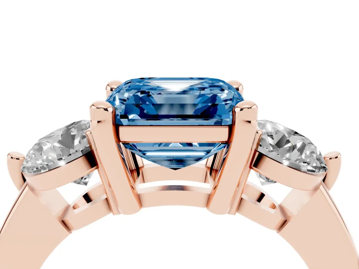 Fancy Blue Three-Stone Asscher Cut Brilliant Cut Solitaire Ring with Prong Setting on a Classic Band Rose gold