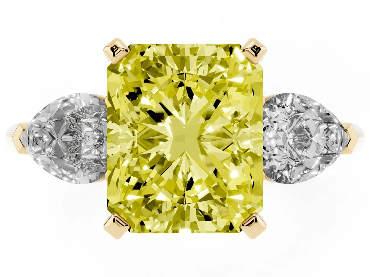 Fancy Yellow Three-Stone Radiant Cut Diamond Ring with Pear Side Stones and Four-Prong Setting Yellow gold