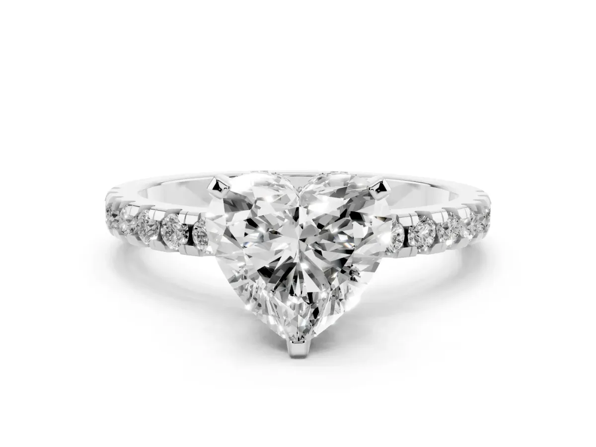 Heart Cut Diamond Solitaire Ring with Round Pavé Band and Four-Prong Setting Silver